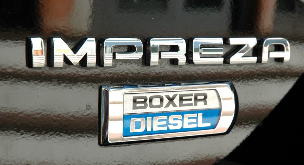Subaru Impreza: Modell- und Motorisierungsschriftzug am Heck. 