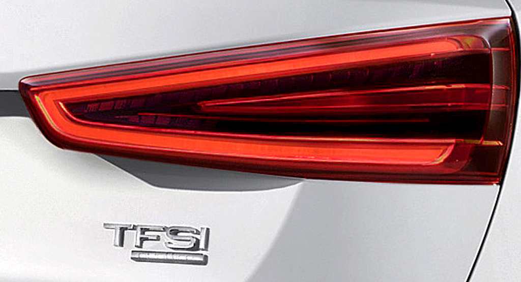Audi Q3: Moderne Leuchteinheit hinten mit Motorisierungsschriftzug.