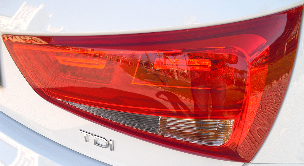 Audi A1 Sportback: Moderne Leuchteinheit hinten mit Motorisierungsschriftzug. 