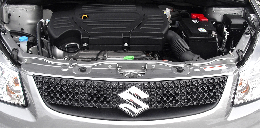 Suzuki SX4: Blick unter die Haube auf den 1,6-Liter mit 88/120 kW/PS.
