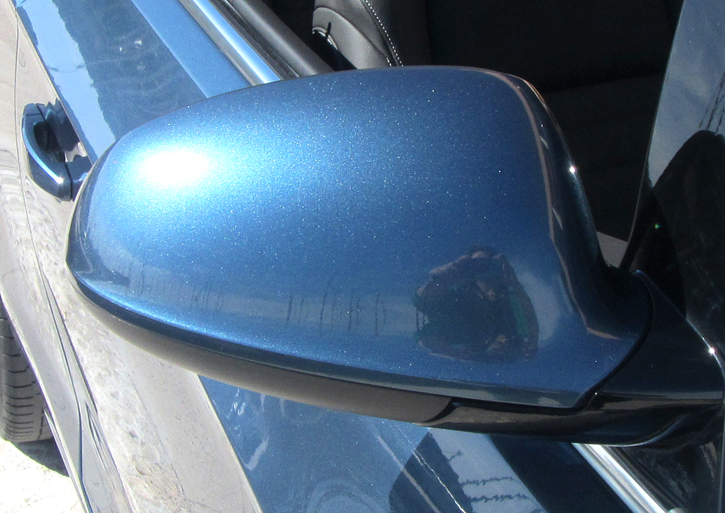Opel Cascada: Blick auf den Außenspiegel auf der Beifahrerseite.