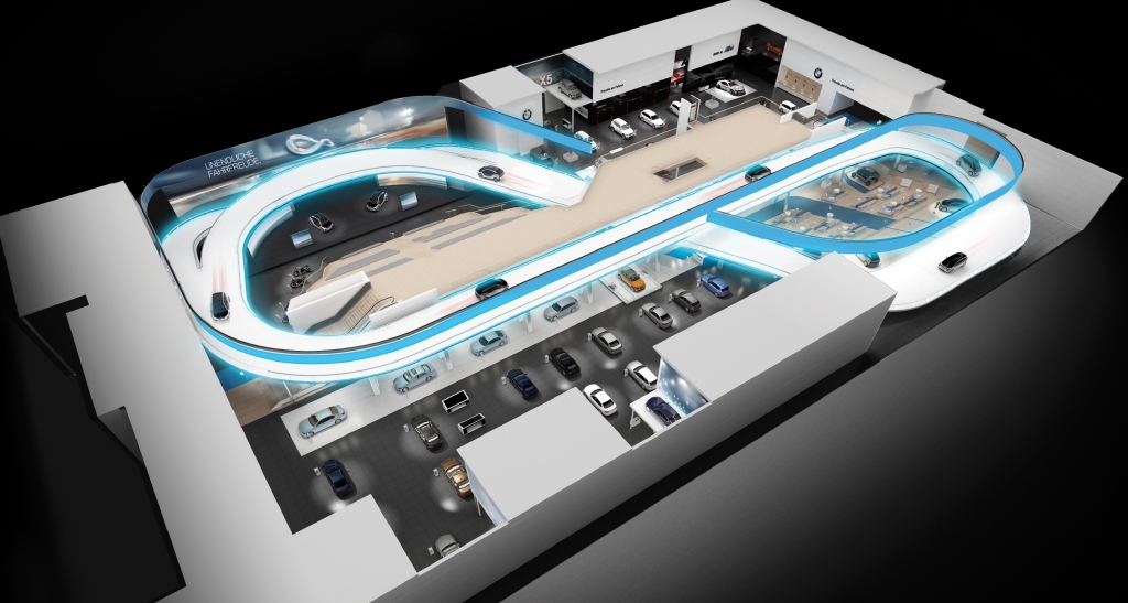 IAA 2013: Besucher fahren im i3 über den BMW-Stand