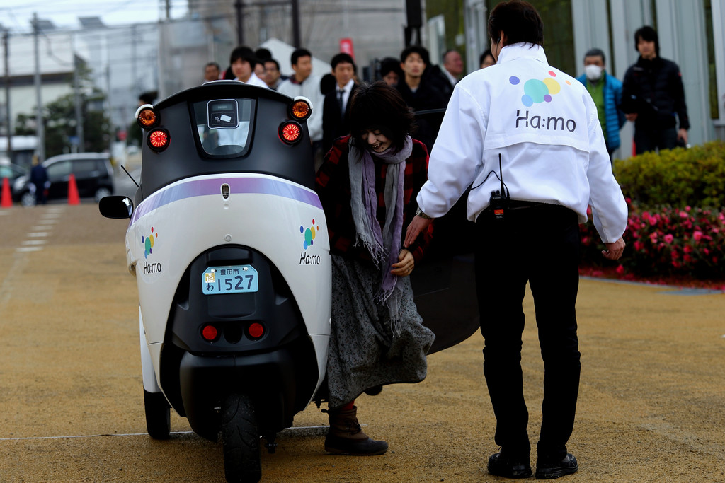 Car-Sharing mit dem Dreirad von Toyota