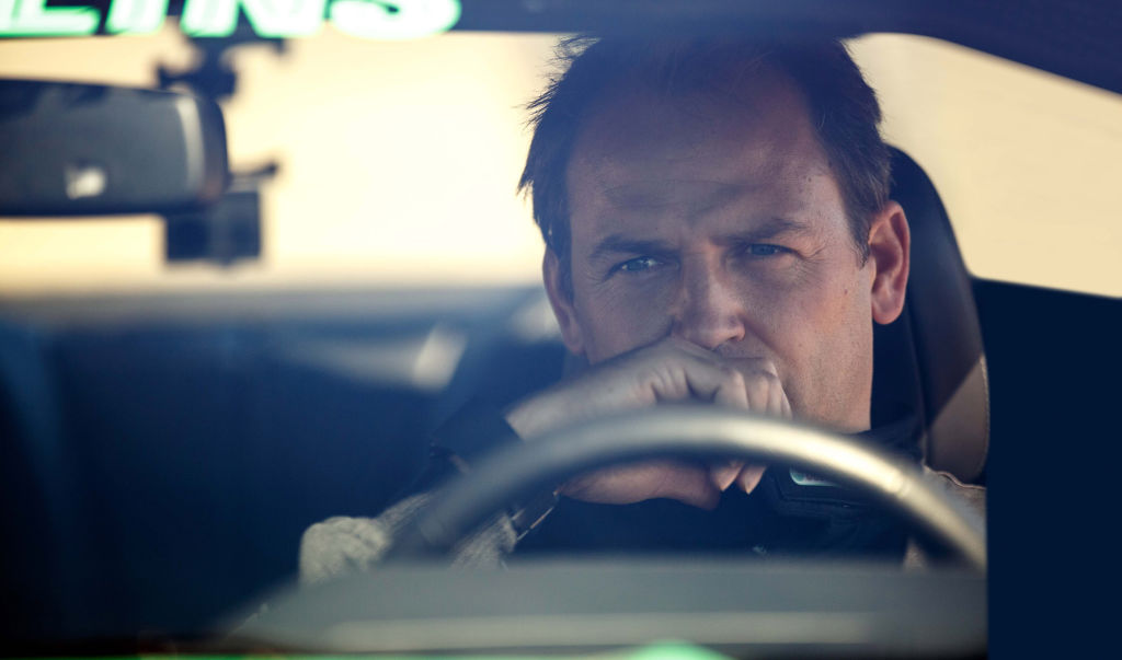 Ben Collins pictured behind the wheel of his Ford Mustang