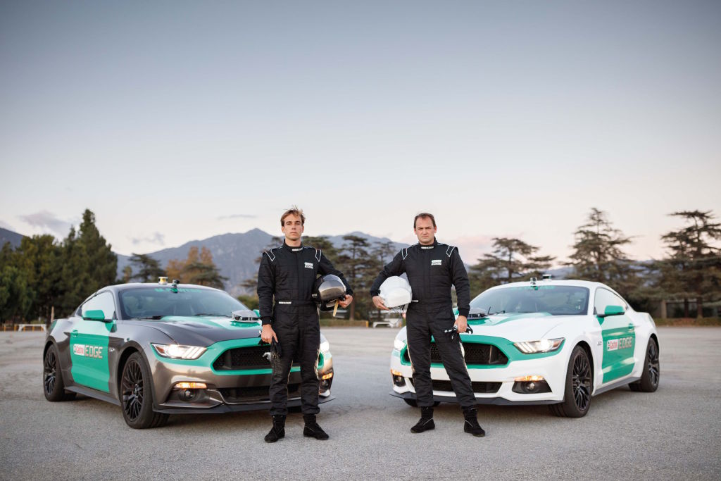 Castrol Virtual Racers - Matt Powers (l) and Ben Collins (r) pose in front of their Ford Mustangs